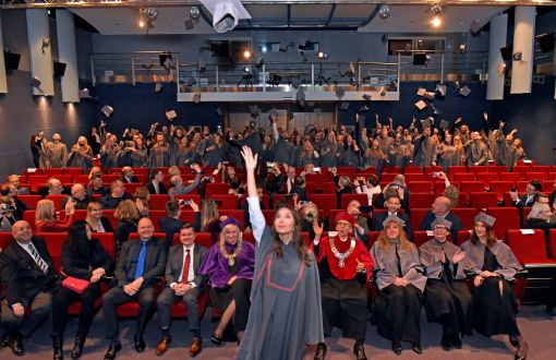 The traditional throwing of graduation hats 