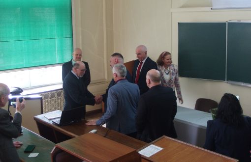 Dr. Stanislaw Pruś receives congratulations after defending his doctorate